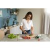 Woman,Preparing,Salad,In,The,Kitchen.
