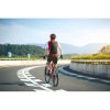 Female,Cyclist,Rides,A,Bike,On,Road,With,No,Handed