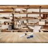 Woodwork,Workshop,Wall,With,Many,Shelves,Holding,A,Variety,Of