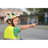 Little,Boy,In,The,Reflective,Vest,Pointing,On,The,Cars